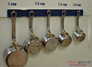 Check out this awesome kitchen storage measuring cup hack.