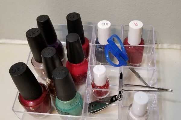 Bathroom vanity organization ideas. Such a neat little organizer I found at  the Dollar Tree to hold my finger nail polish. 