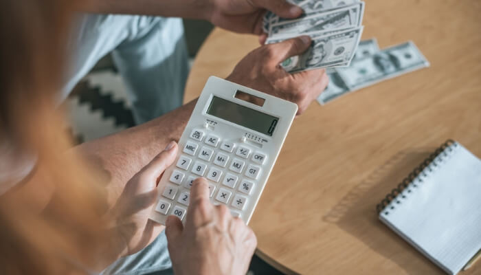 Man and women doing their zero based budget.