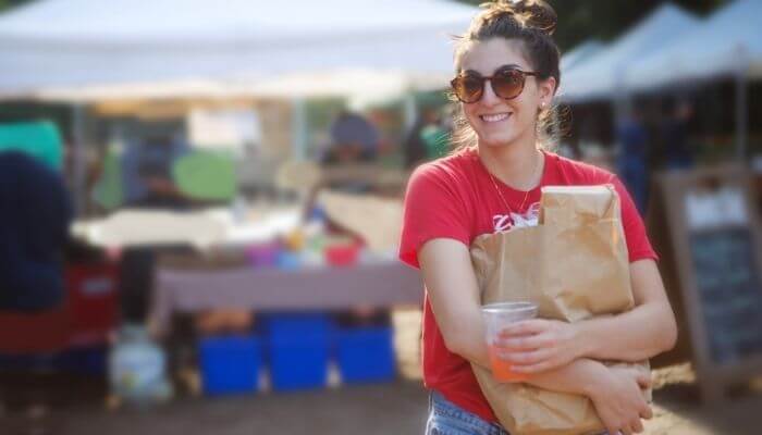 teen at local farmers market