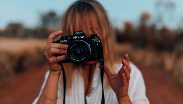 girl taking photos